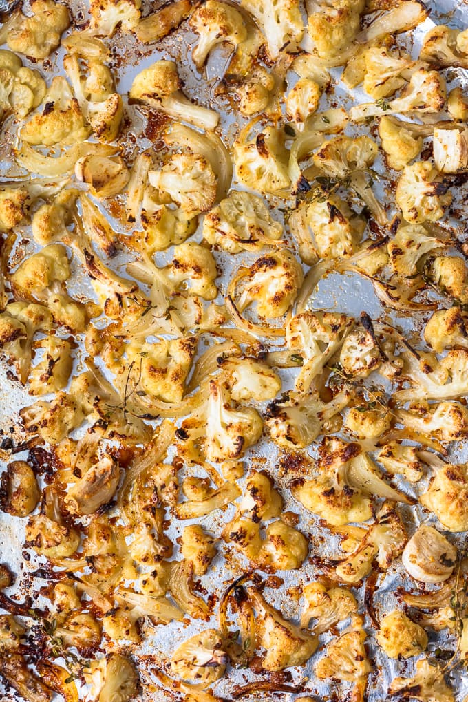 Oven roasted cauliflower on a baking sheet