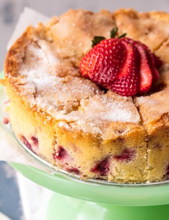 strawberry buttermilk cake on a cake plate