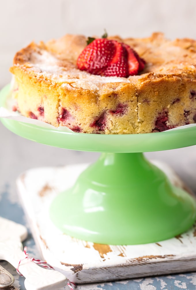 Lemon Strawberry Cake on a green cake stand