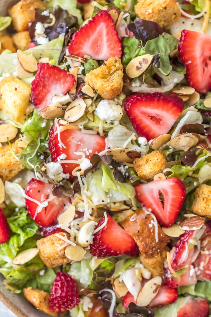 Lettuce, strawberries, feta, sliced almonds, croutons