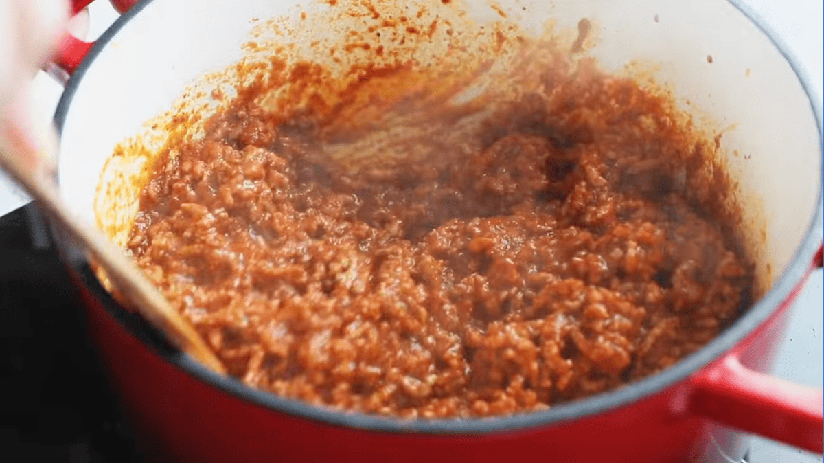 cooked seasoned beef in a dutch oven.