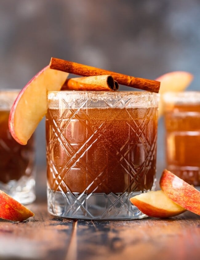 apple butter old fashioned in glass garnished with apple and cinnamon