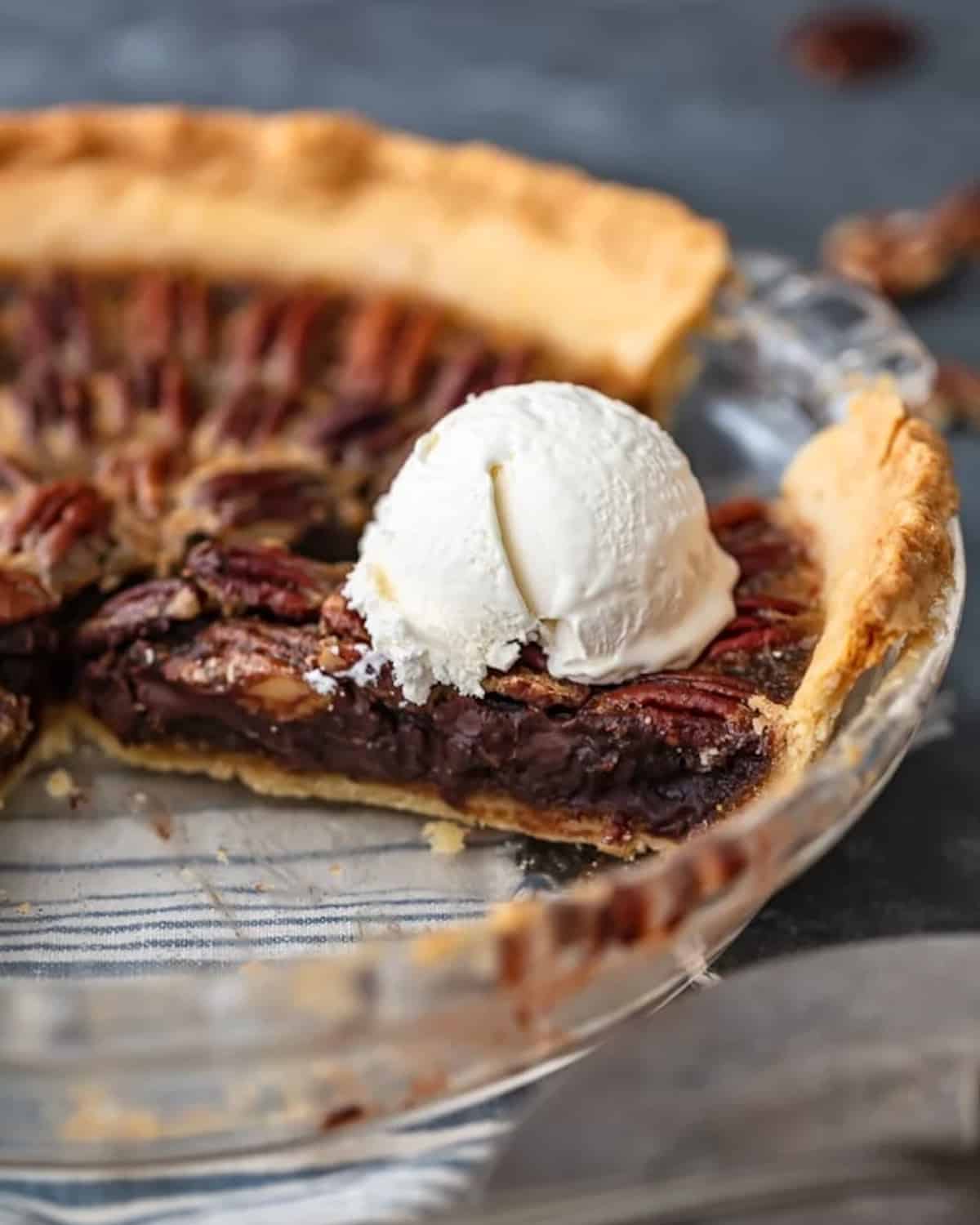 A slice of chocolate pecan pie.