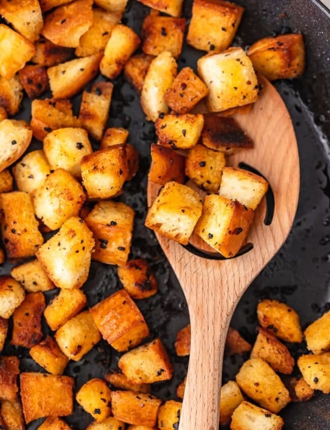 Garlic croutons are so easy to make, and they add the perfect flavor and crunch to your salads. Making croutons on the stove is quick and simple! Just follow this homemade crouton recipe and skip the pre-made ones!