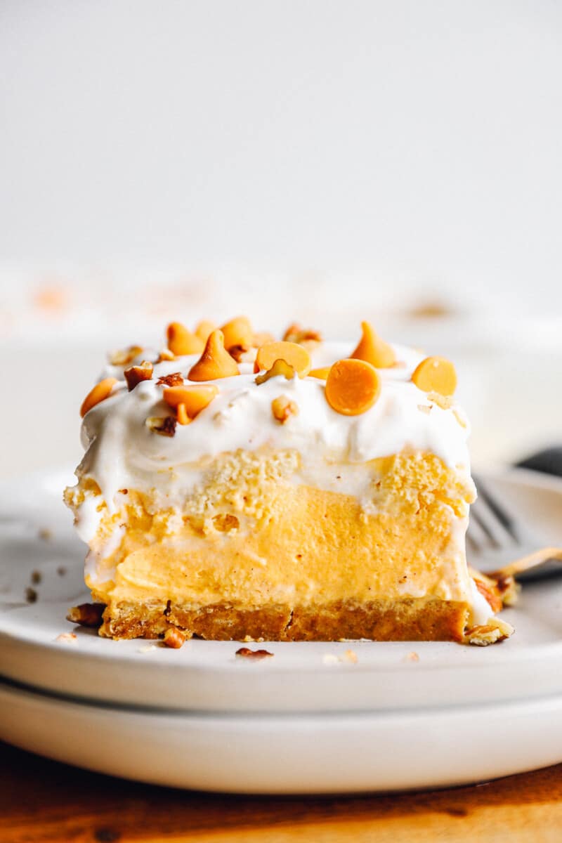 slice of pumpkin pie dessert lasagna on white plate