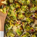 spicy cheesy broccoli on a baking dish