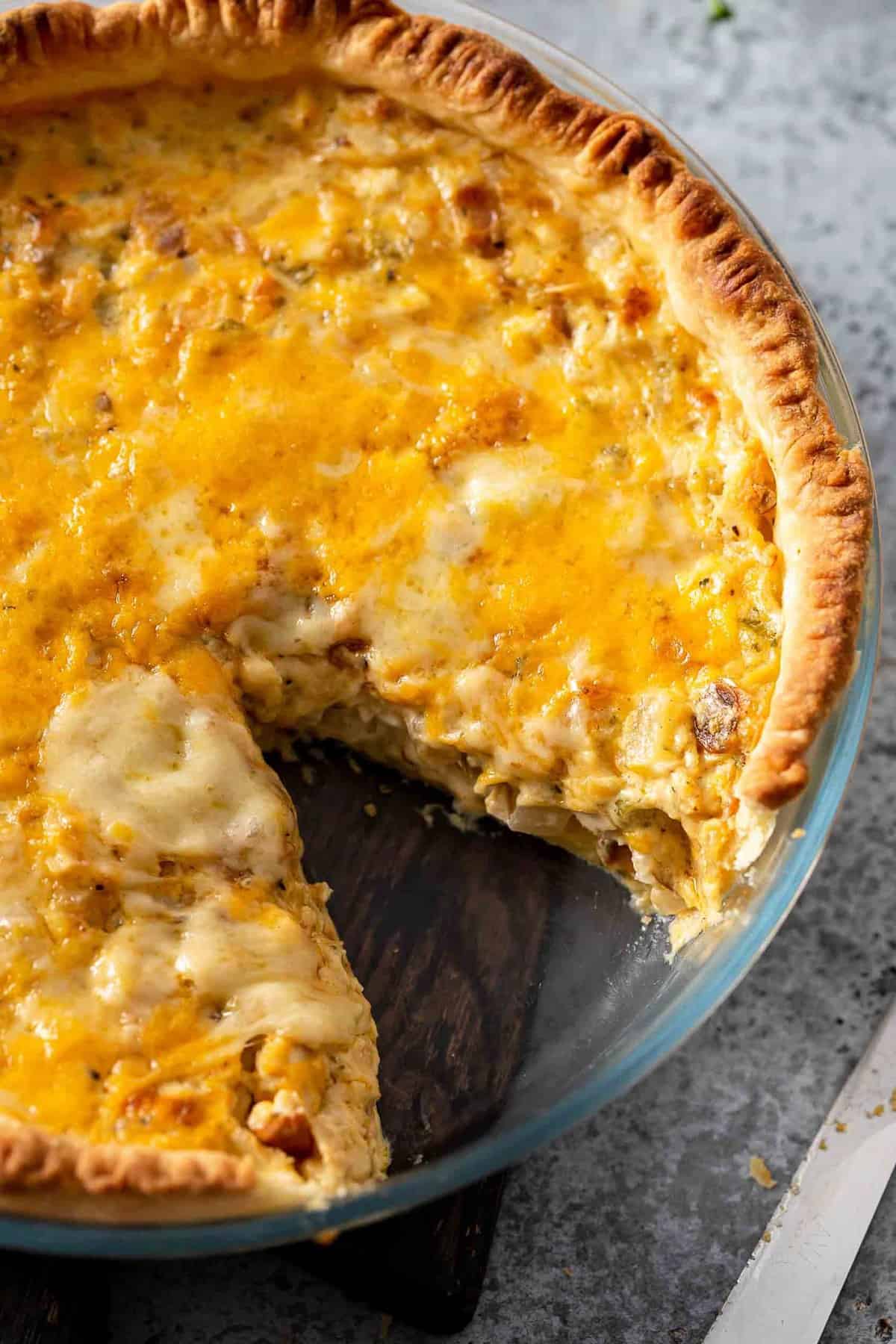 Hot Chicken Salad Pie with one slice removed.