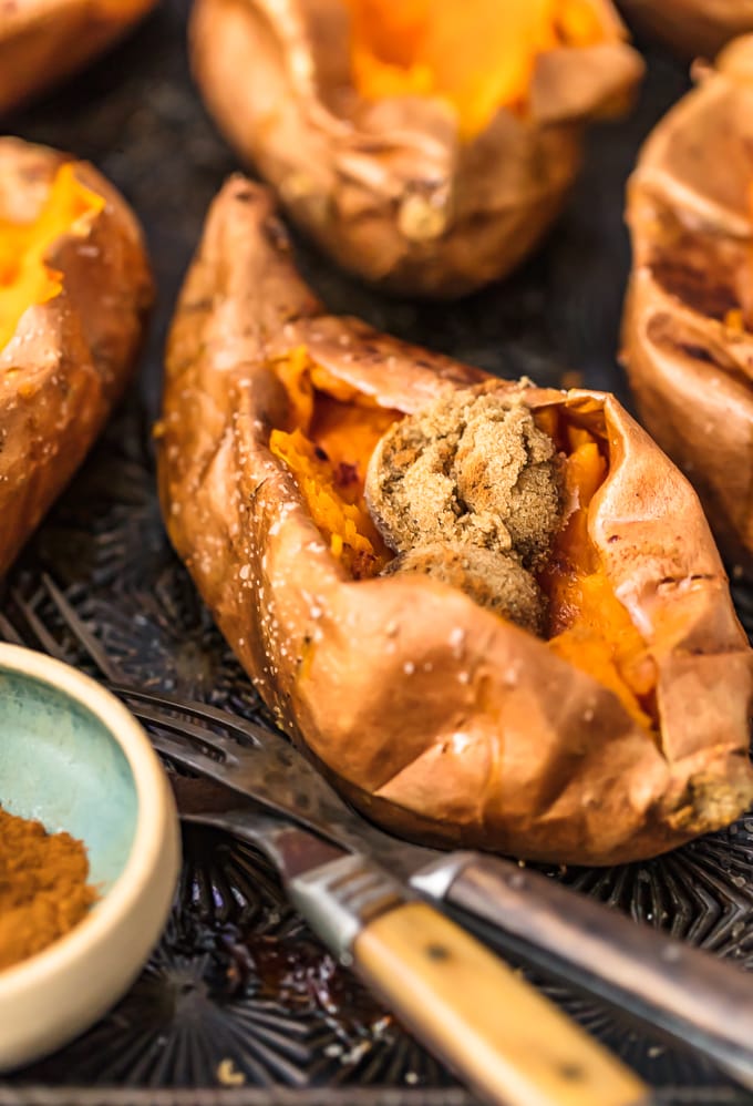 the perfect baked sweet potato filled with brown sugar, cinnamon, and butter