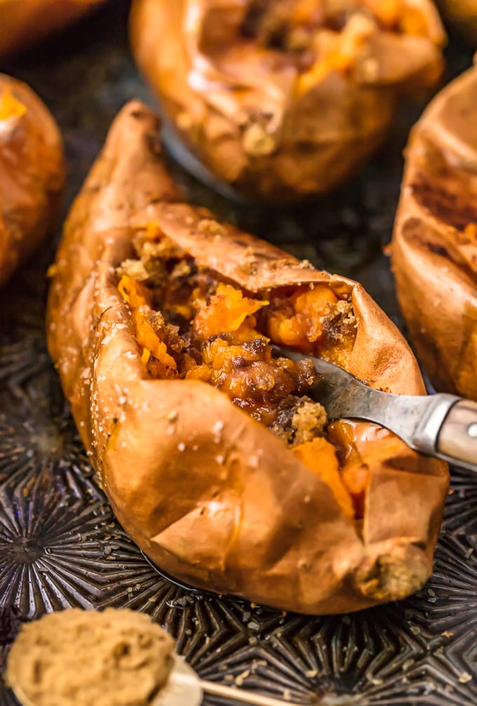 how to bake sweet potatoes: a sweet potato filled with cinnamon sugar and butter