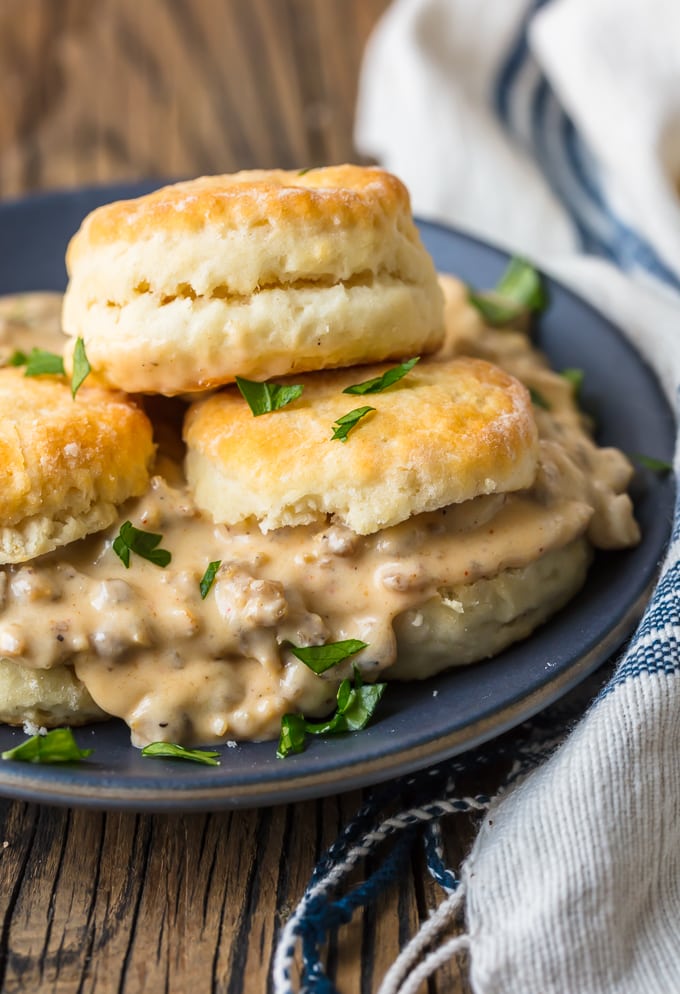 a plate of biscuits and sausage gravy