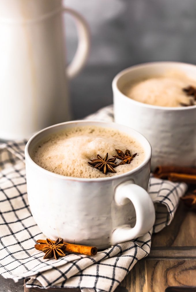 chai tea recipe with bourbon in two white mugs