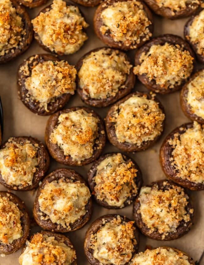 Sausage Stuffed Mushrooms are cheesy, savory, and so delicious! This easy, cheesy sausage stuffed mushroom recipe is the perfect appetizer for holidays, game day, or any special occasion. Mushroom caps are stuffed full of cheese, sausage, onion, and more to create the most amazing flavor!