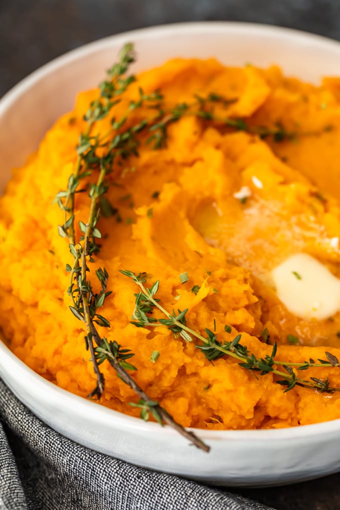 Savory sweet potato mashed potatoes with butter and thyme.