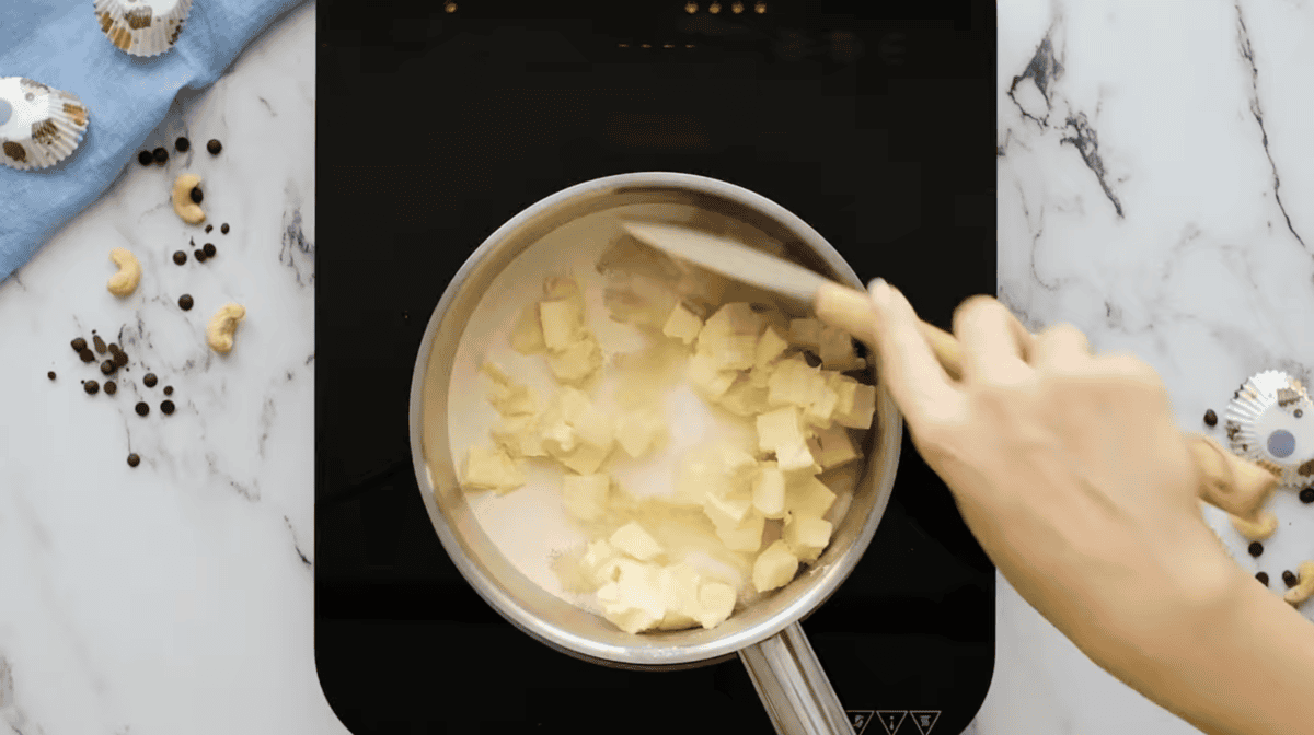 milk, butter, and sugar in a saucepan with a rubber spatula.