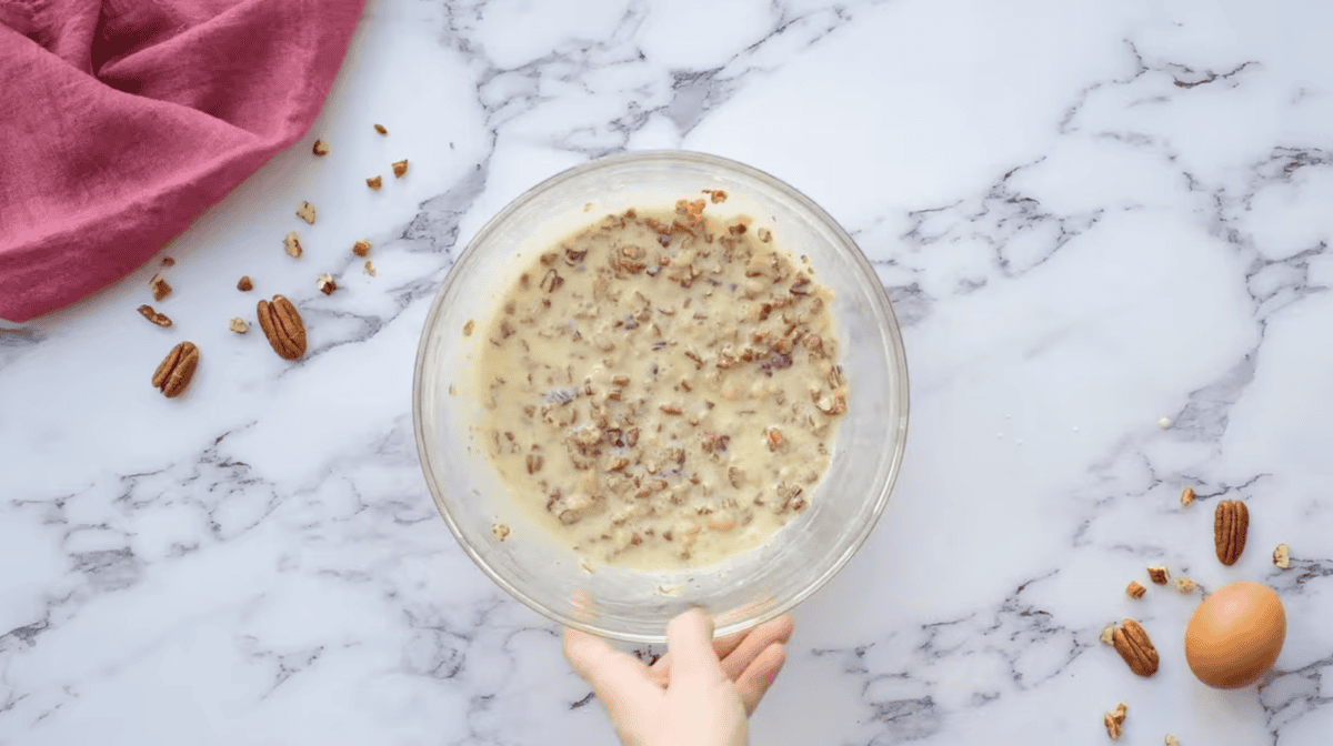 pecan pie filling in a glass bowl.