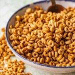 Hot Buttered Cheerios are so tasty and so snackable! This sweet and salty snack mix recipe is sure to please guests at any party. 