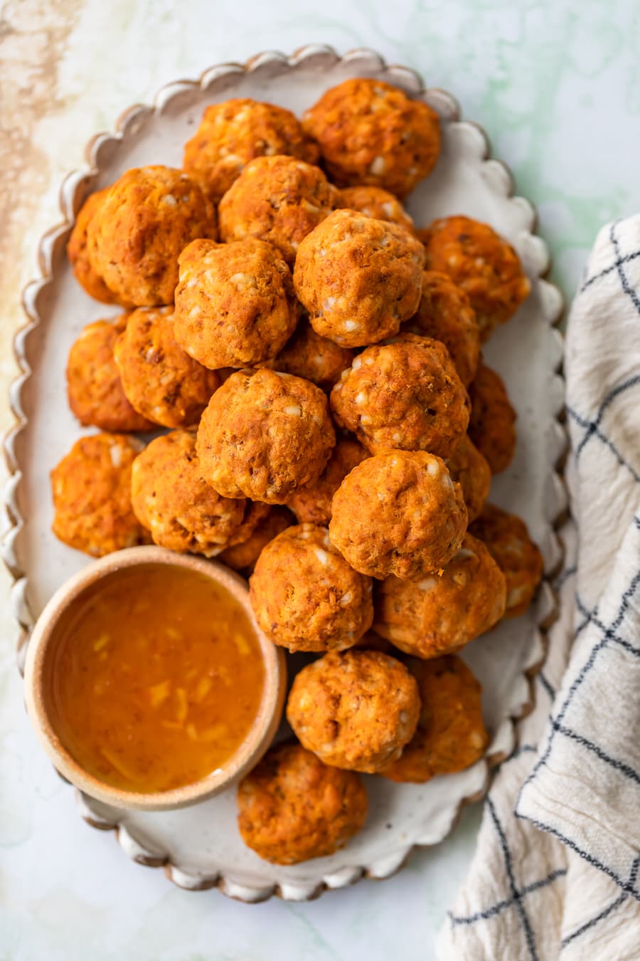 overhead view of a plate of sweet potato and chorizo sausage balls