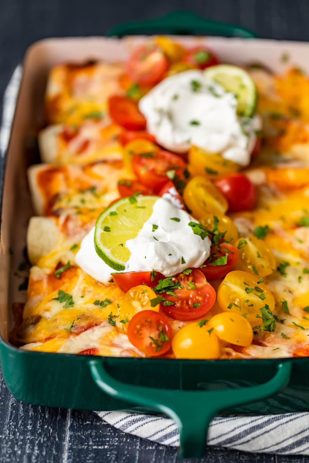 shredded beef enchiladas in a casserole dish