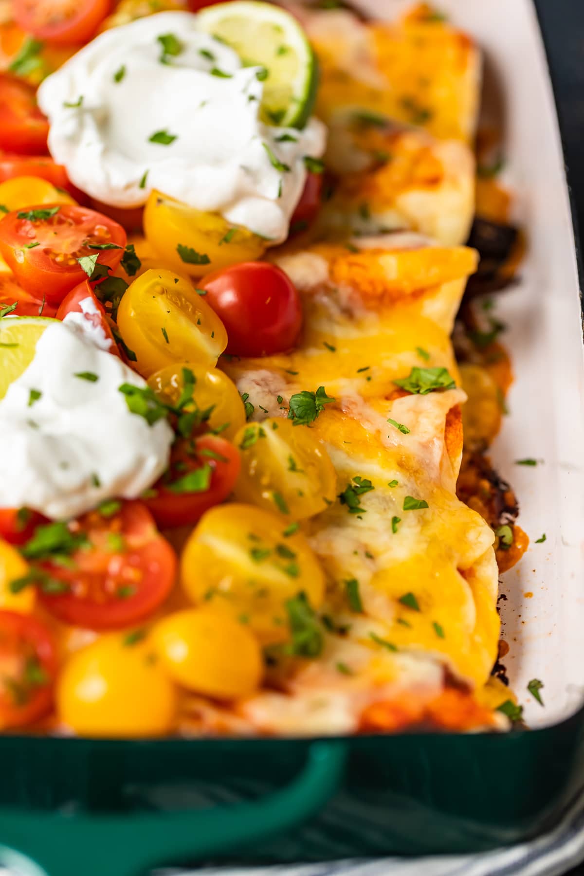 close up on beef enchiladas supreme