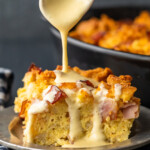 Eggs Benedict Casserole has all the flavor you love from the classic dish, mixed into one super tasty breakfast casserole. This EASY eggs benedict recipe is made with english muffins, filled with ham, and topped off with a simple eggs benedict sauce. This makes the perfect Mother's Day or Easter brunch!