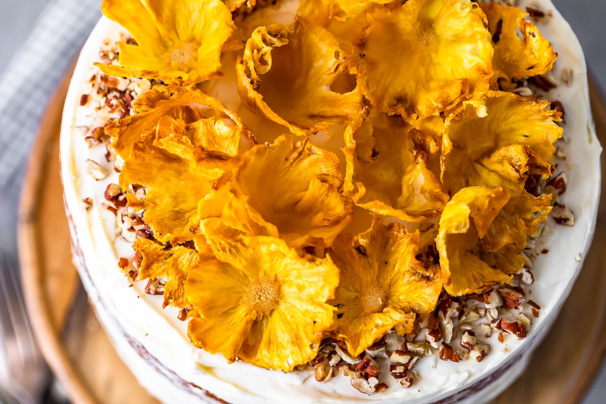 pineapple flowers on top of a cake