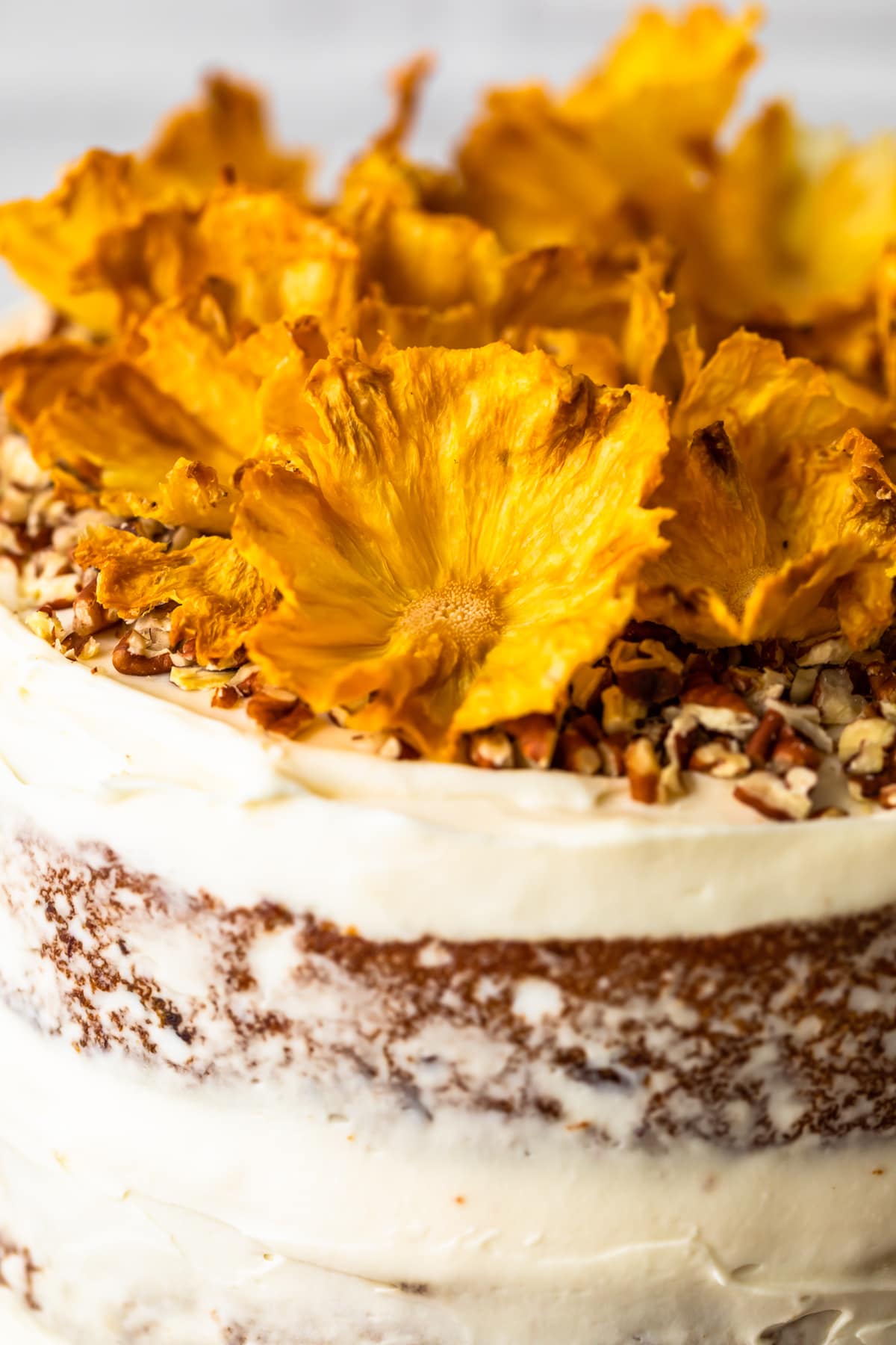 pineapple flowers on top of a cake