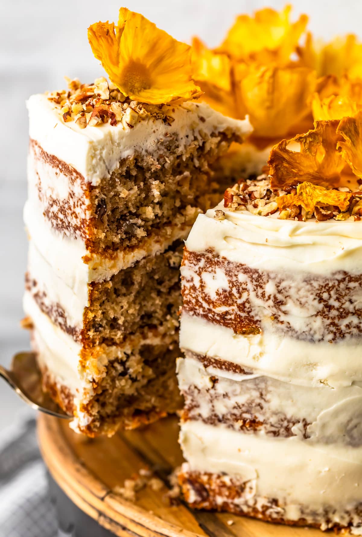 close up on hummingbird cake with a slice taken out