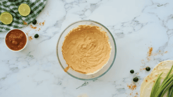 flavored cream cheese in a glass bowl.