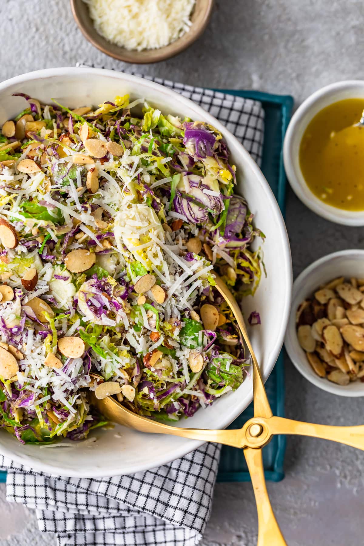 shaved brussels sprout salad in a white bowl