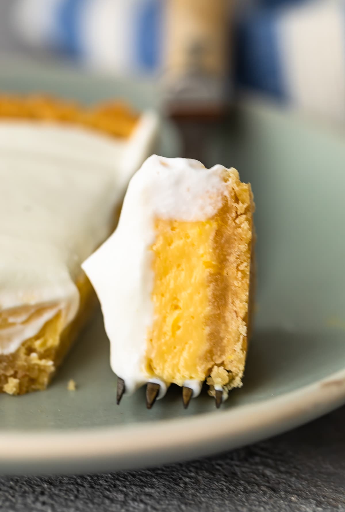 close up on a bite of lemon pie