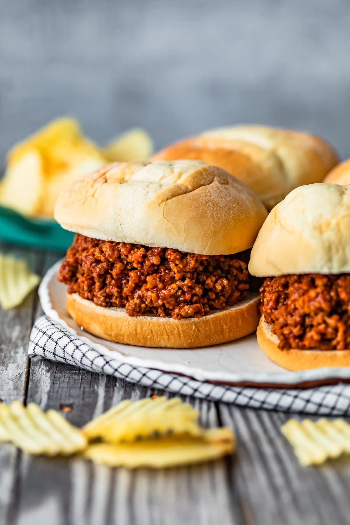 a plate of sloppy joes set on a table