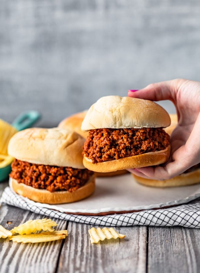 hand picking up a sloppy joe