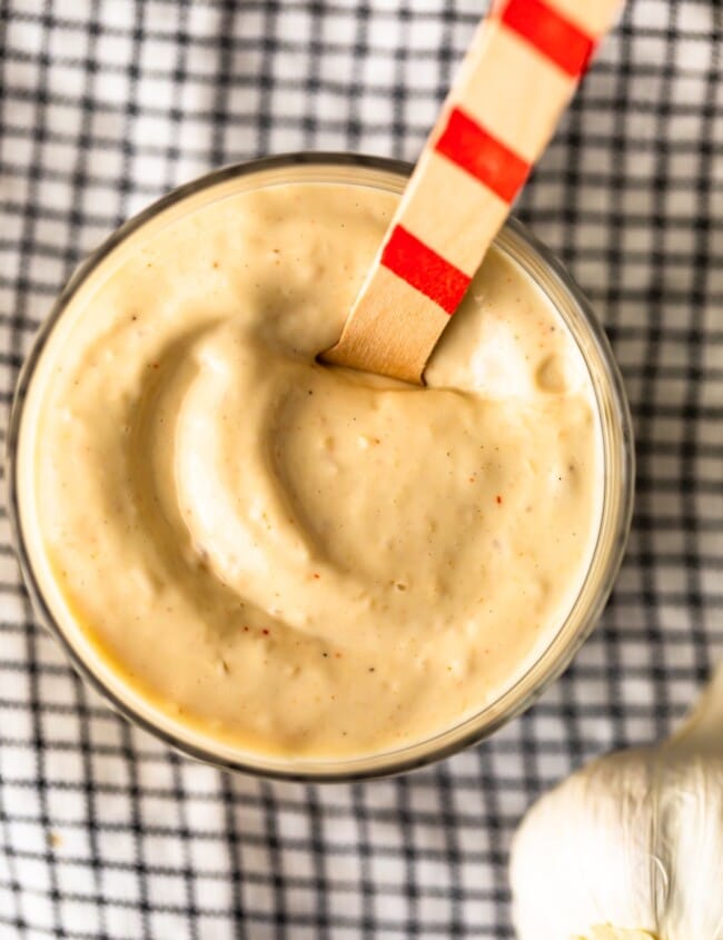 Garlic Aioli is a super flavorful sauce that goes with so many recipes. This creamy Roasted Garlic Aioli recipe is easy, tasty, and slightly addicting. It's one of my favorite dips for fries, and goes perfectly with vegetables, chicken, fish, and more! Let me show you how to make the BEST aioli!