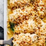 lifting up chicken breast - swiss chicken bake