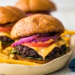 grillled cheeseburgers on a plate