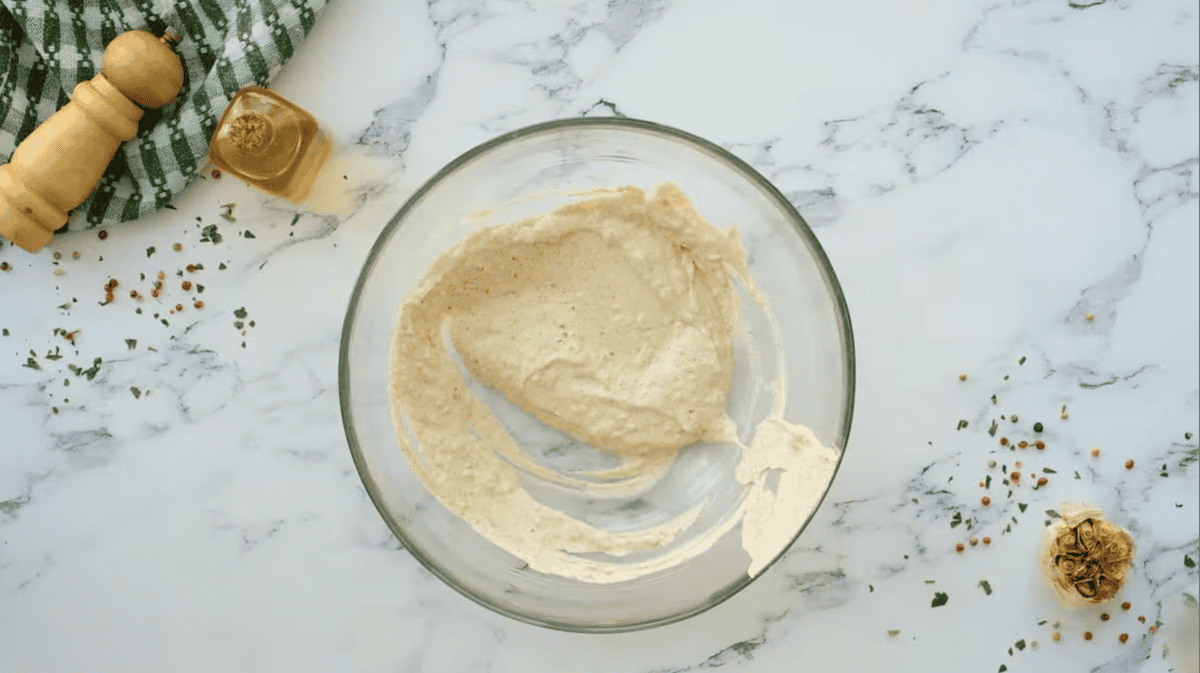 spiced yogurt marinade in a glass bowl.