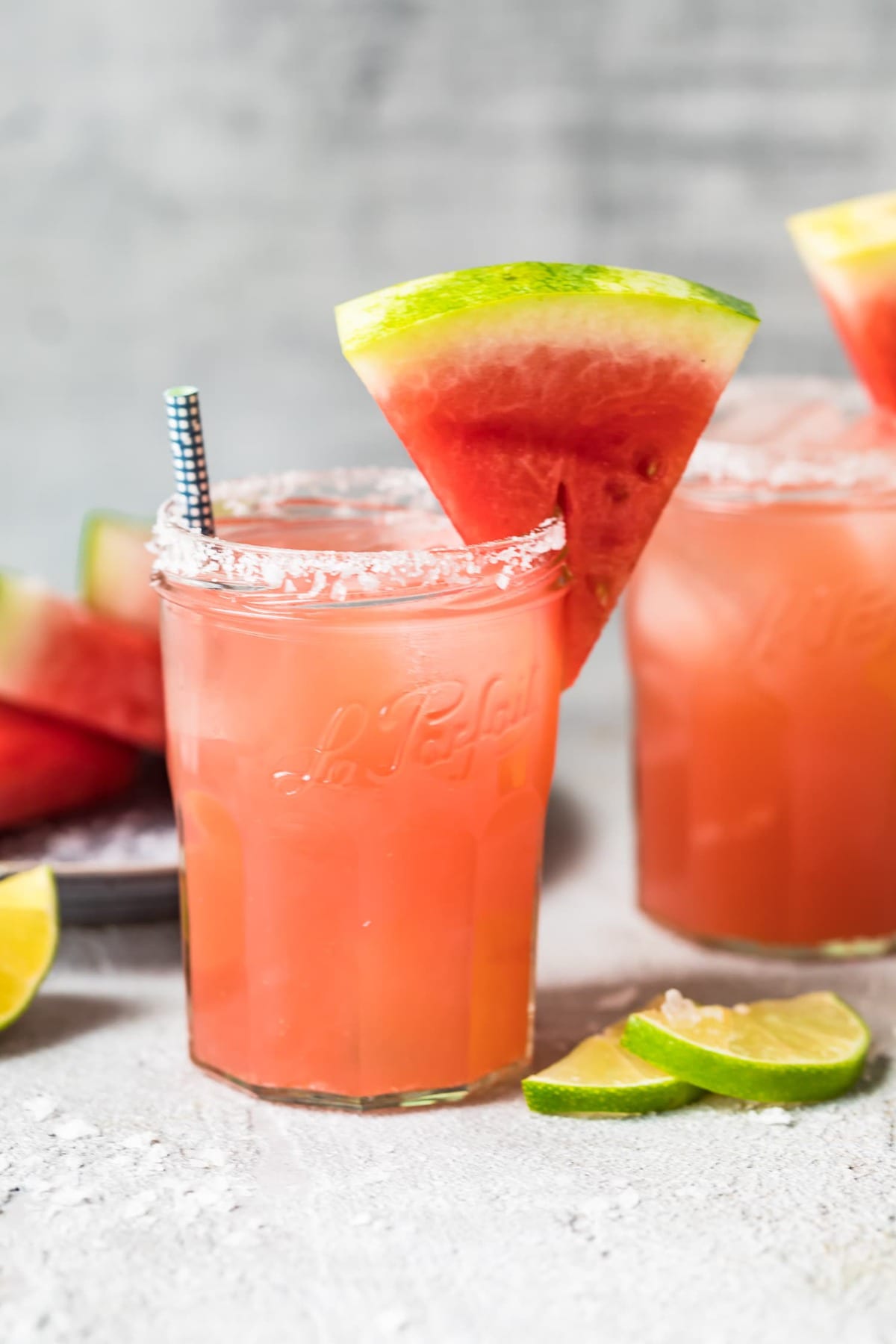 watermelon margarita recipe in glasses with watermelon triangles