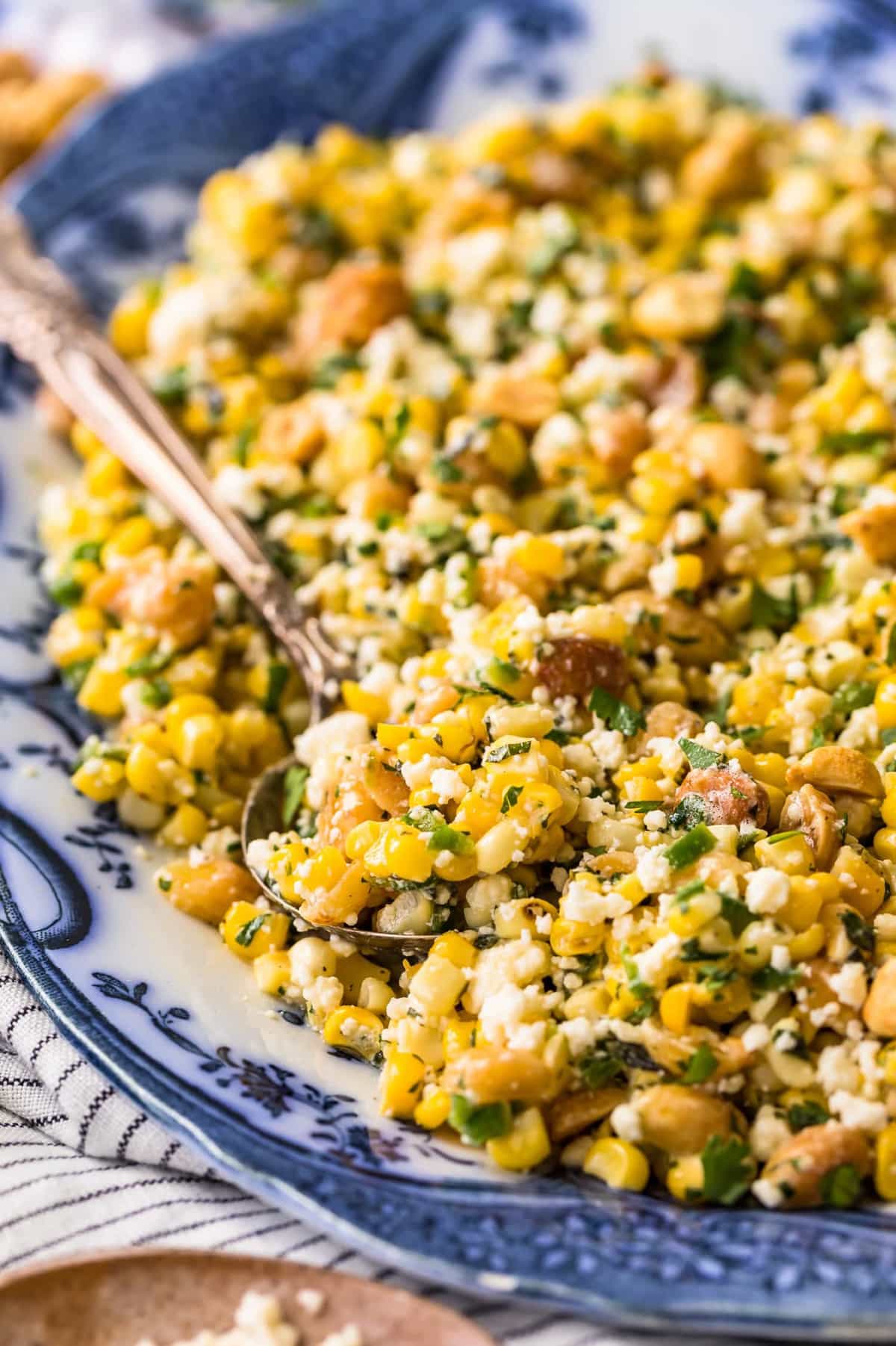 Close up of corn salad on a sppon