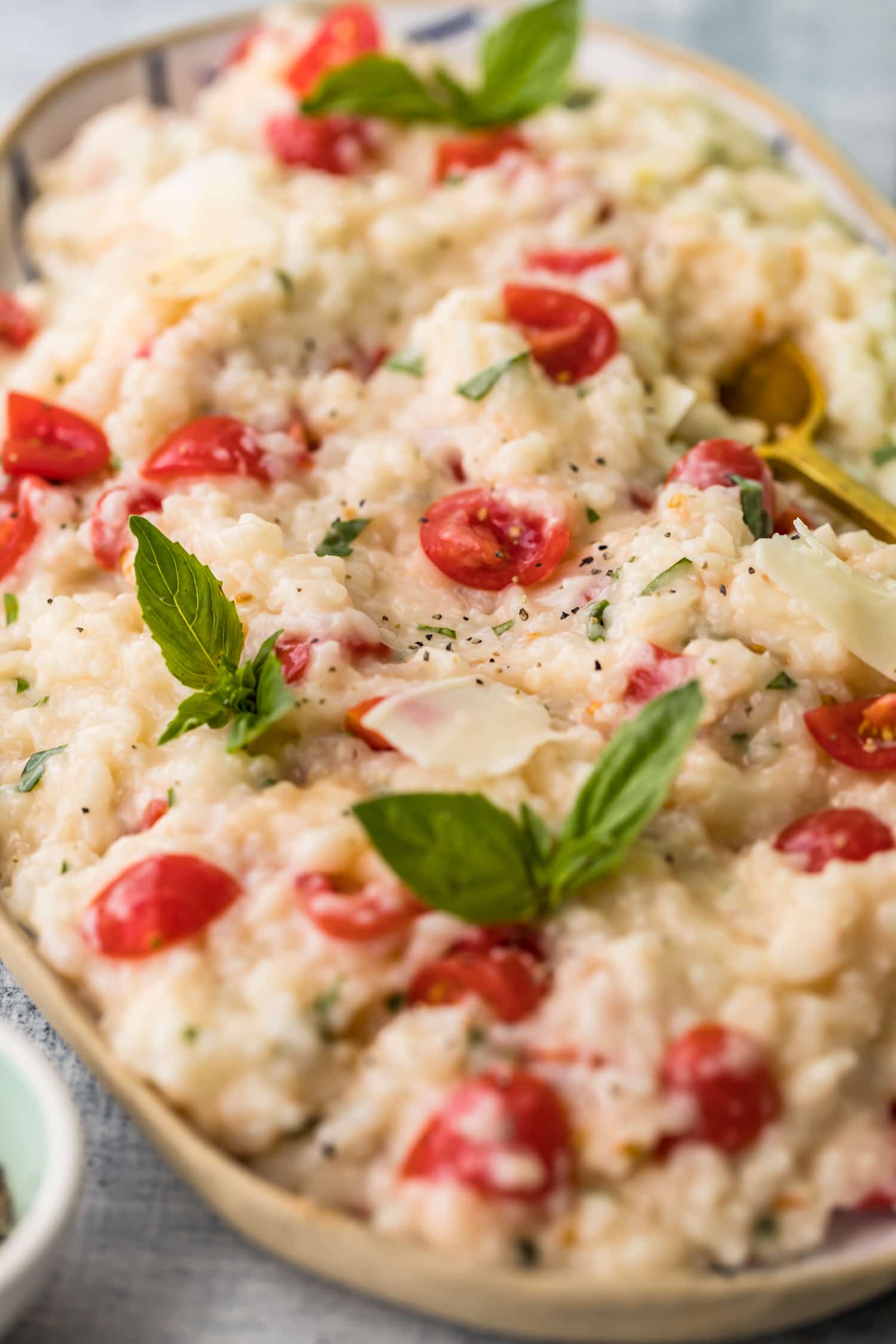 Oven baked risotto finished with fresh basil leaves