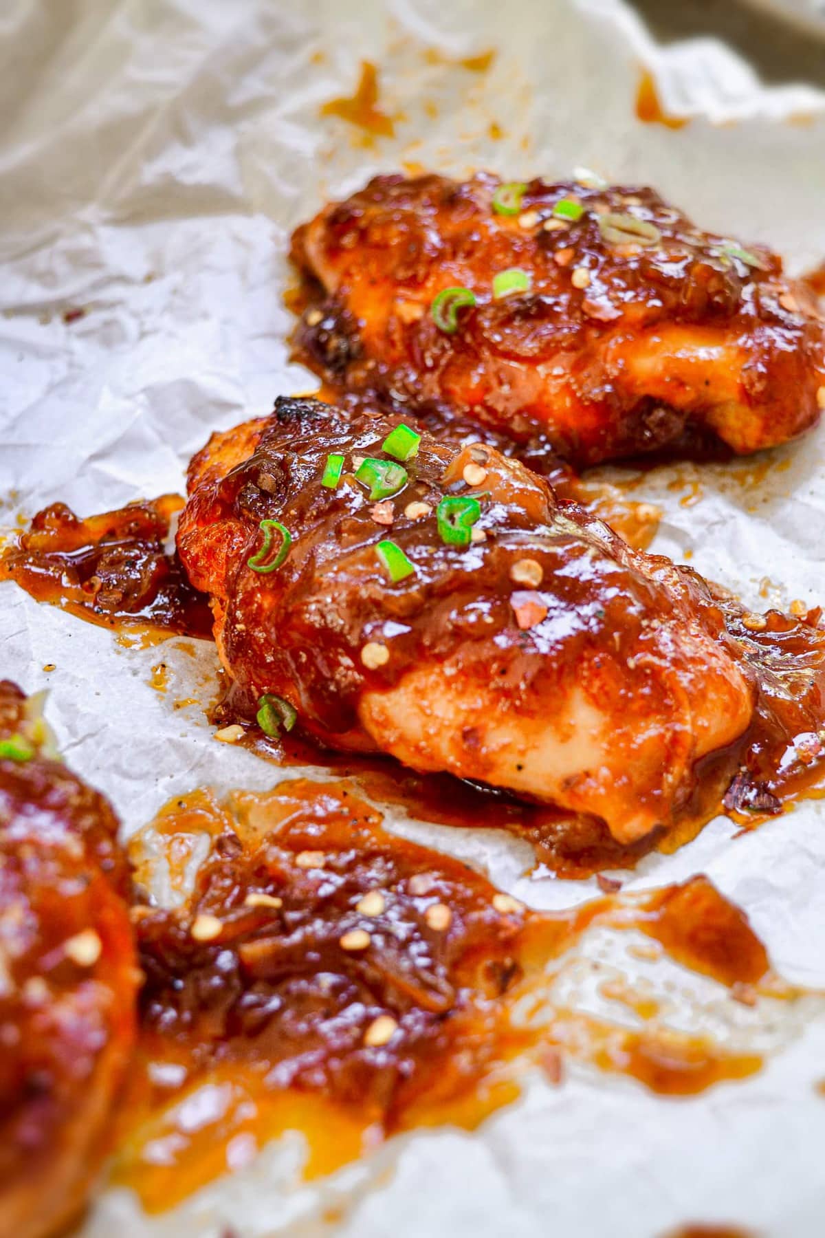 chicken breasts covered in glaze.