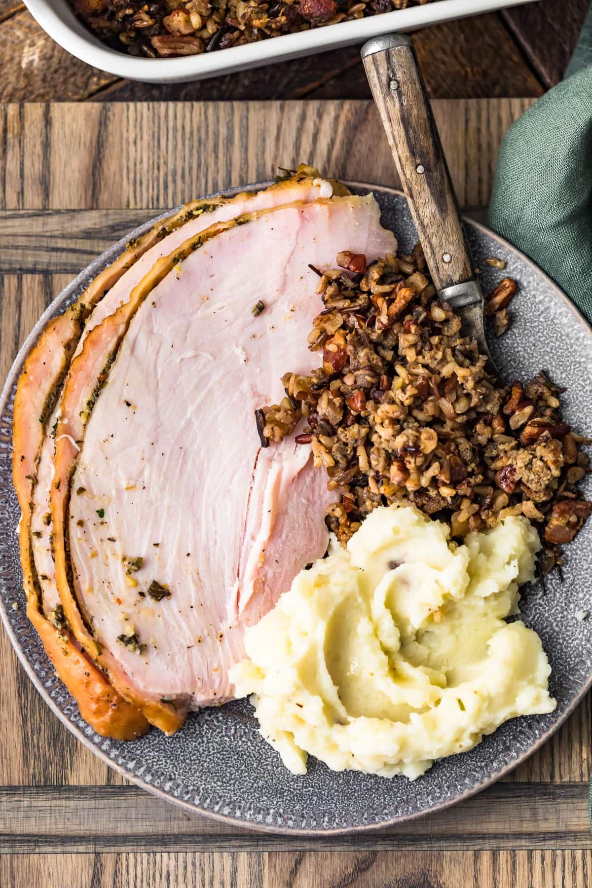 Wild Rice Sausage Stuffing served with eat and potatoes