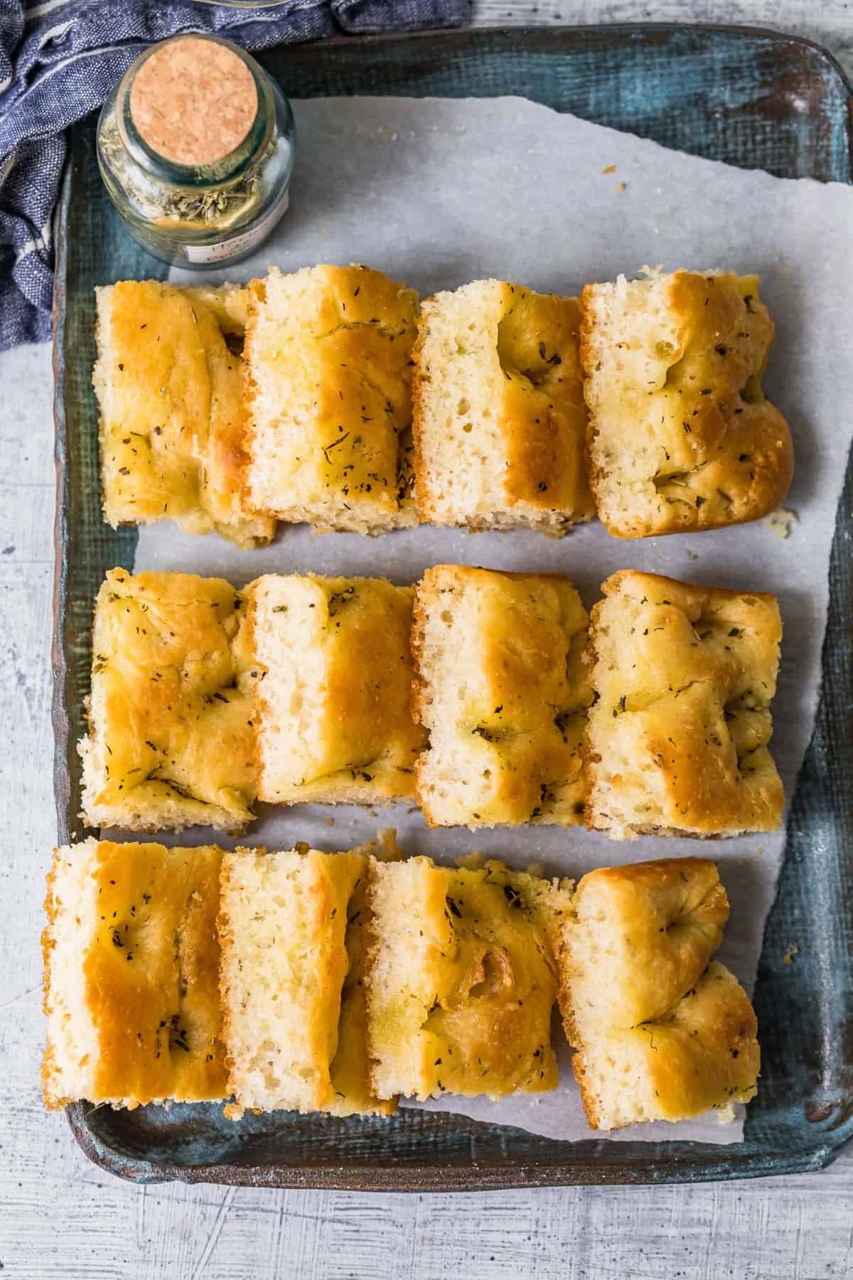 Three rows of focaccia bread ready to serve