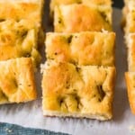 pieces of sliced focaccia bread on platter