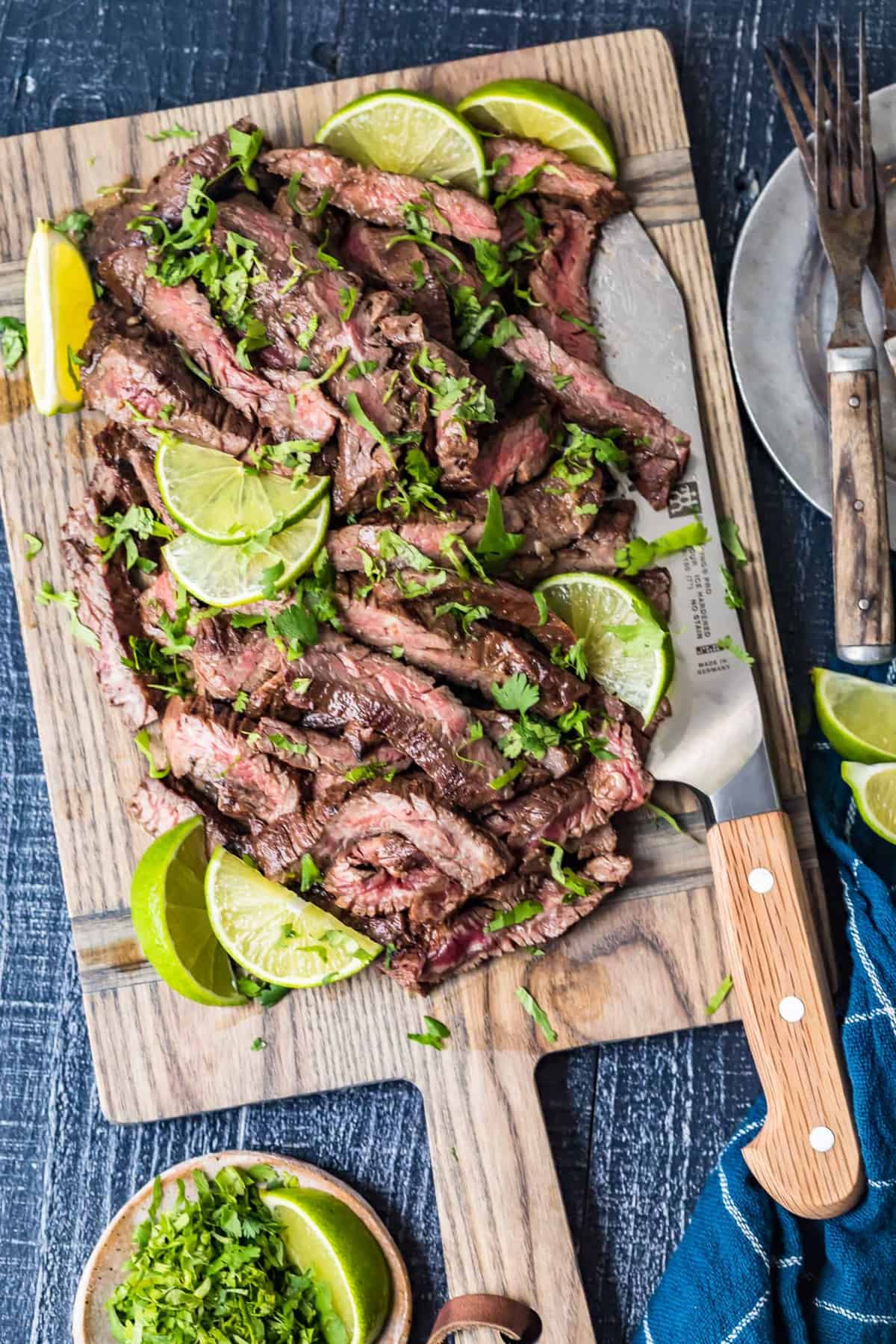 Carne Asada Steak on a wooden chopping board