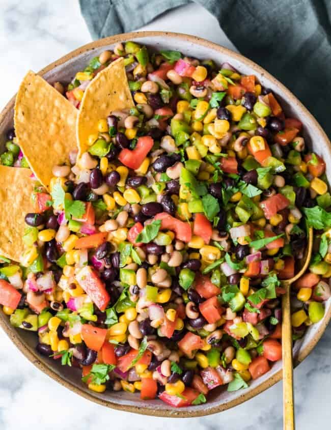 cowboy caviar in pan with chips