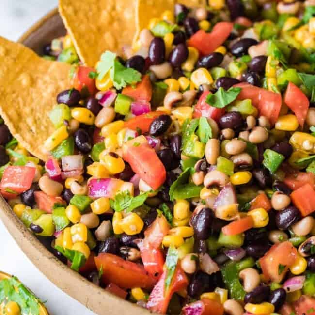 Easy cowboy caviar with tortilla chips.