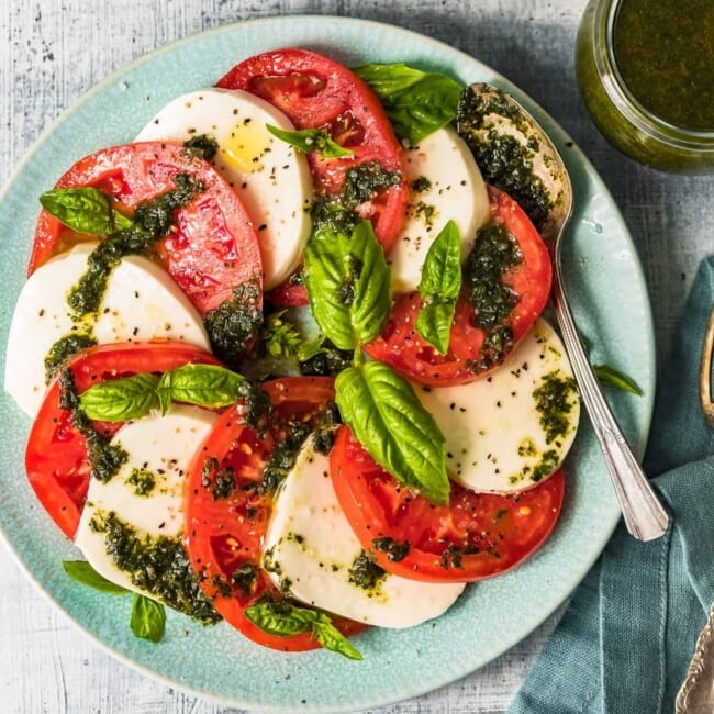 fresh caprese salad on blue plate