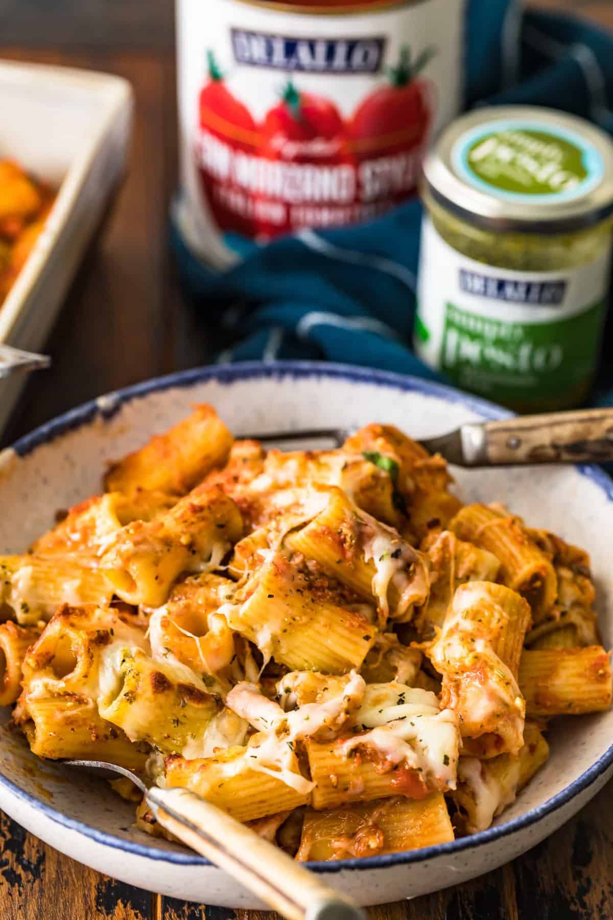 Baked rigatoni served in a blue and white bowl