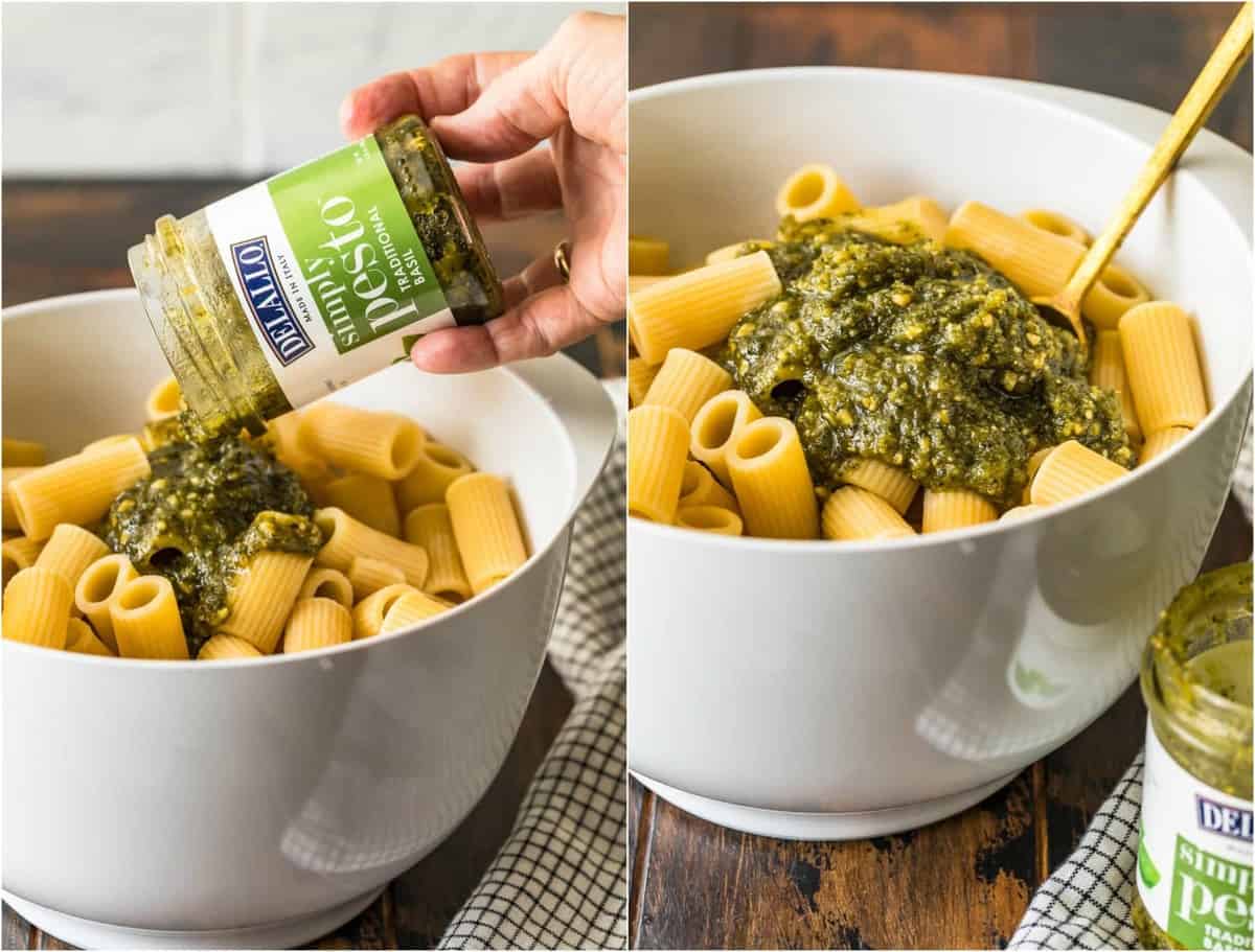 Pesto being poured and mixed into the pasta