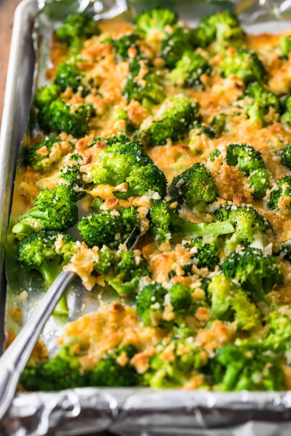 A spoon on a sheet pan of the side dish